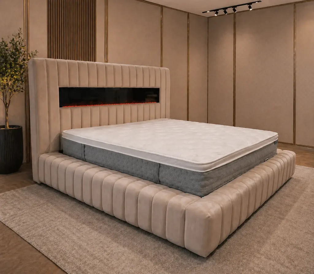 Luxuriöses Polsterbett mit großem gepolstertem Kopfteil im Möbel Plaza Showroom Hamburg